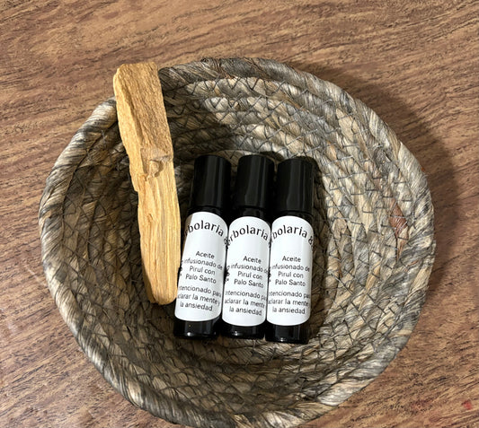 Aceite Esoterico de pirul con palo santo.